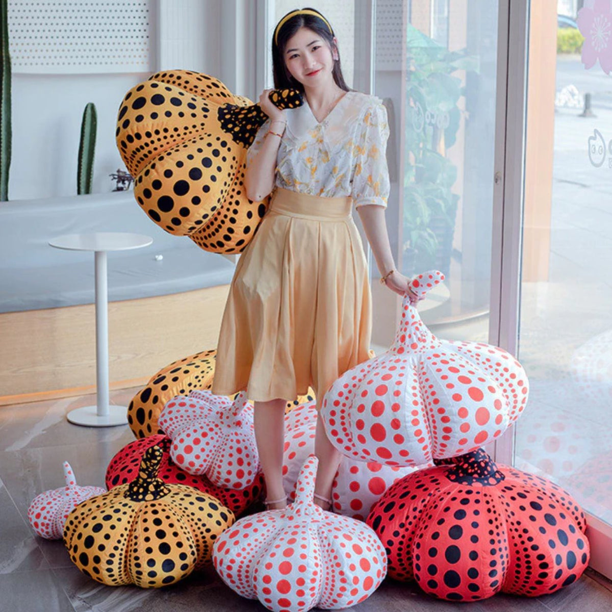 Delightfully Spooky Yayoi Kusama Pumpkin Plushies for Halloween Fun
